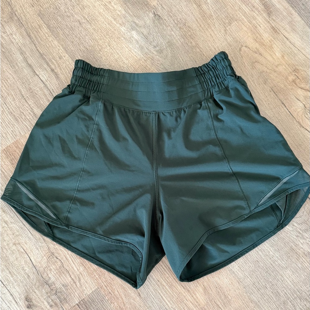 EUC Lululemon Athletica Dark Green Hotty Hot HR Short 4” Lined Shorts